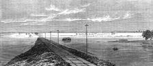 The Flood in the Fens: the submerged railway between Lynn and Wisbeach, 1862. Creator: Unknown