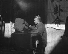 The fortune teller, Chinatown, San Francisco, between 1896 and 1906. Creator: Arnold Genthe