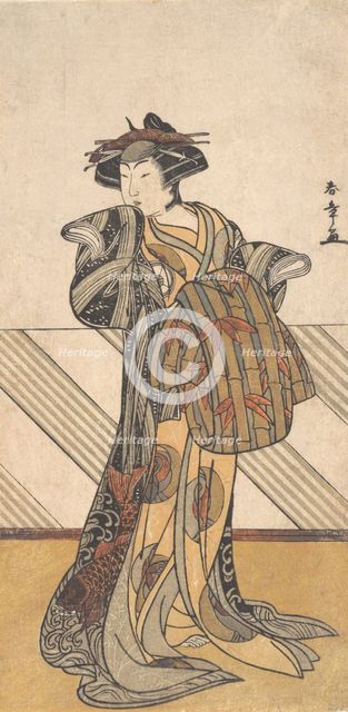 The Fourth Iwai Hanshiro as a Courtesan Dressed in a Pink Kimono, ca. 1778. Creator: Shunsho.