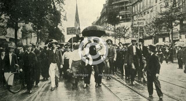 'The French Call to Arms: Reservists joining the Colours in Paris', c1914, (c1920).  Creator: Unknown.