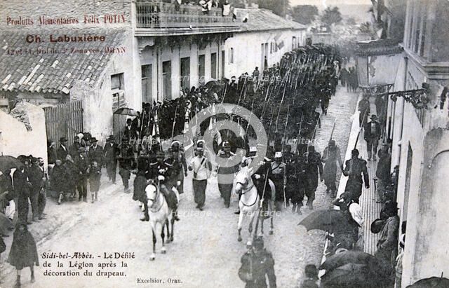 The French Foreign Legion parading through the streets of Sidi Bel Abbes, Algeria, 1906. Artist: Unknown