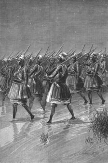 'The French in Dahomey -- The King of Dahomey's Amazons crossing a swamp on the march 1890. Creator: Unknown