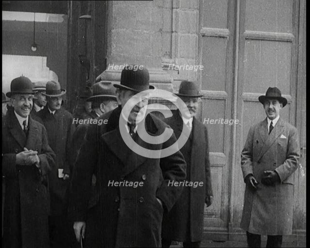 The French Prime Minister Aristide Briand Standing Outside with a Group of Male Civilians..., 1926. Creator: British Pathe Ltd.