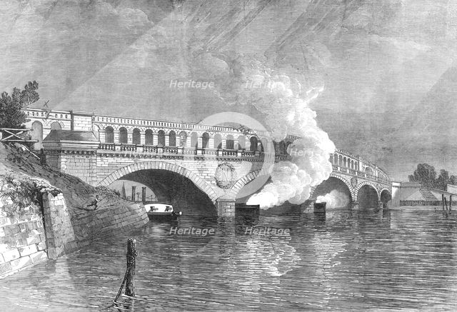 The French Siege of Paris: bridge at the Point du Jour, with gun-boats of the Commune, 1871. Creator: Unknown.