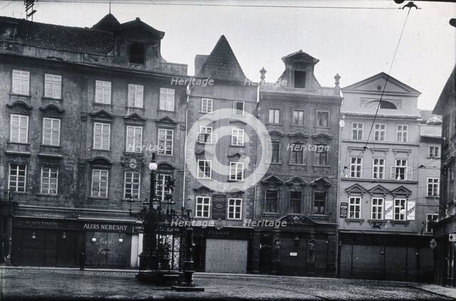 The front of a pharmacy in a cobbled square in Prague, c1890s. Creator: Zikmund Reach.