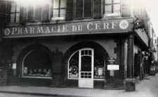 The front door of the Pharmacie du Cerf on the corner of the street, Strasbourg, c1900s.. Creator: Unknown