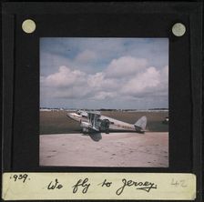 The Guernsey and Jersey Airways de Havilland D H 86 Express G-ACZP on a runway, perhaps at..., 1939. Creator: Norman Kingsley Harrison