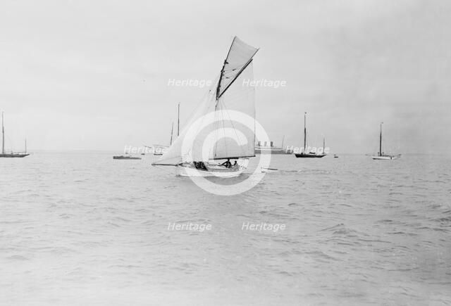 The gaff cutter 'Wigeon' under sail, 1910. Creator: Kirk & Sons of Cowes.