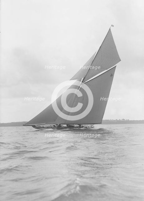 The gaff rigged 15 Metre yacht 'Paula III' sailing close-hauled, 1915. Creator: Kirk & Sons of Cowes.