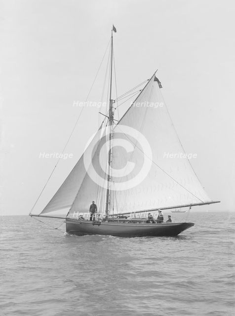 The gaff rigged cutter 'Wych' under sail, 1914. Creator: Kirk & Sons of Cowes.