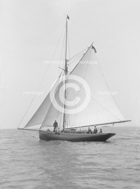The gaff rigged cutter 'Wych' under sail, 1914. Creator: Kirk & Sons of Cowes.