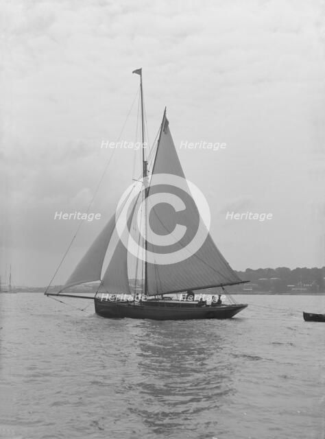 The gaff rigged cutter 'Wych' under sail, 1914. Creator: Kirk & Sons of Cowes.