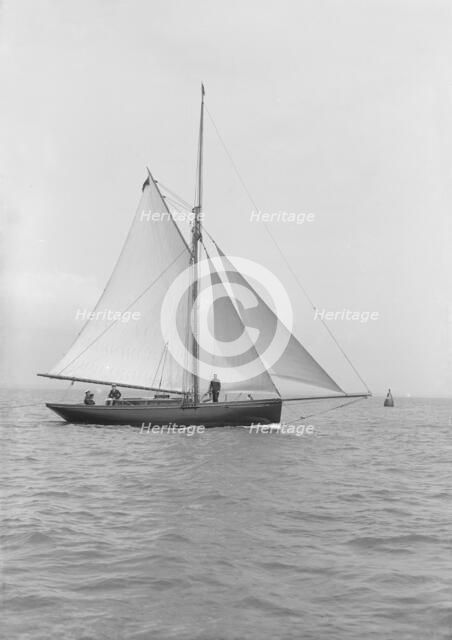 The gaff rigged cutter 'Wych' under sail, 1914. Creator: Kirk & Sons of Cowes.