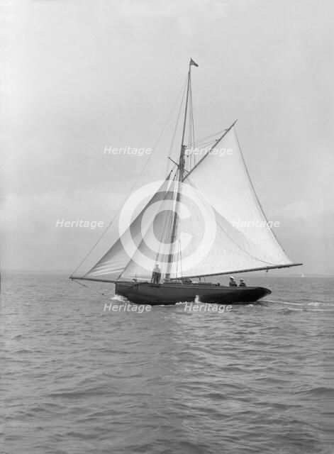 The gaff rigged cutter 'Wych' under sail, 1914. Creator: Kirk & Sons of Cowes.