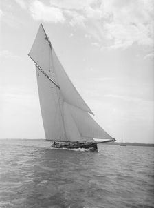 The gaff rigged cutter Bloodhound sailing close-hauled, 1911. Creator: Kirk & Sons of Cowes