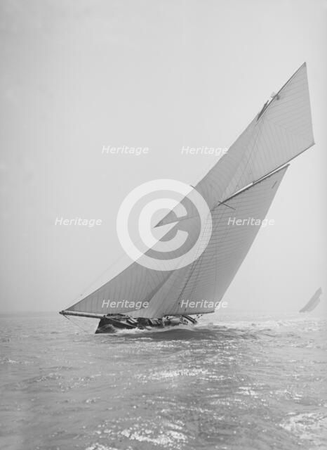 The gaff rigged cutter 'Bloodhound' sailing close-hauled, 1911. Creator: Kirk & Sons of Cowes.