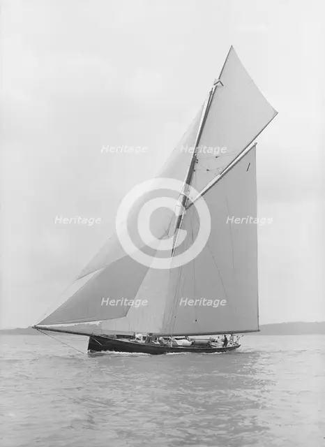 The gaff rigged cutter 'Bloodhound' sailing close-hauled, 1913. Creator: Kirk & Sons of Cowes.