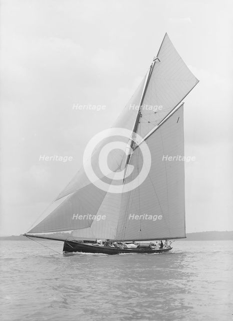 The gaff rigged cutter 'Bloodhound' sailing close-hauled, 1913. Creator: Kirk & Sons of Cowes.