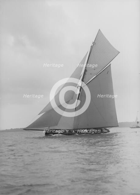 The gaff rigged cutter 'Bloodhound' sailing close-hauled, 1913. Creator: Kirk & Sons of Cowes.