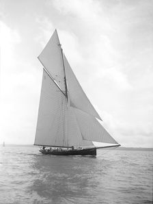 The gaff rigged cutter Bloodhound sailing close-hauled, August 1911. Creator: Kirk & Sons of Cowes