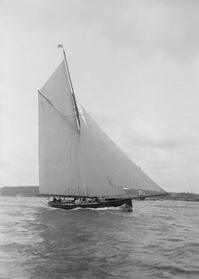 The gaff rigged cutter Bloodhound sailing close-hauled, August 1912. Creator: Kirk & Sons of Cowes