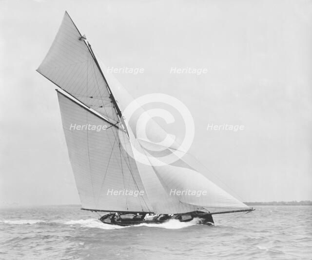 The gaff rigged cutter 'Bloodhound' sailing close-hauled. Creator: Kirk & Sons of Cowes.