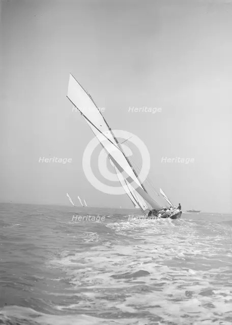 The gaff rigged cutter 'Bloodhound' sailing close-hauled, leaves wake, 1911. Creator: Kirk & Sons of Cowes.
