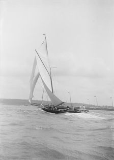 The gaff rigged cutter Bloodhound sailing on a broad reach, August 1912. Creator: Kirk & Sons of Cowes