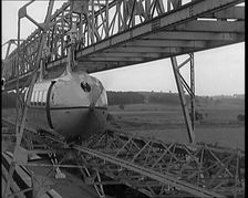 The George Bennie Railplane Driven by a Propeller at Each End Moving Along a Suspended Mono..., 1931 Creator: British Pathe Ltd