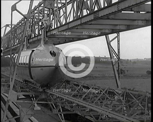 The George Bennie Railplane Driven by a Propeller at Each End Moving Along a Suspended Mono..., 1931 Creator: British Pathe Ltd.