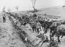 The German advance through Galicia: A bivouac of troops by the roadside 1915