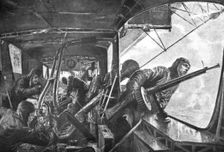 The German Air Fleet; On board a zeppelin: in the rear, under attack by Allied planes..., 1917. Creator: Unknown