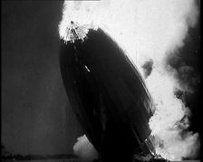 The German Airship, the Hindenburg, its Rear Half Destroyed And Obscured By Smoke With..., 1937. Creator: British Pathe Ltd