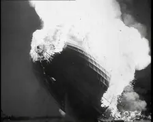 The German Airship, the Hindenburg, its Rear Half Destroyed And Obscured By Smoke With..., 1937. Creator: British Pathe Ltd