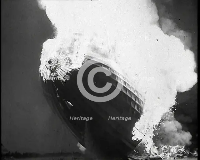 The German Airship, the Hindenburg, its Rear Half Destroyed And Obscured By Smoke With..., 1937. Creator: British Pathe Ltd.