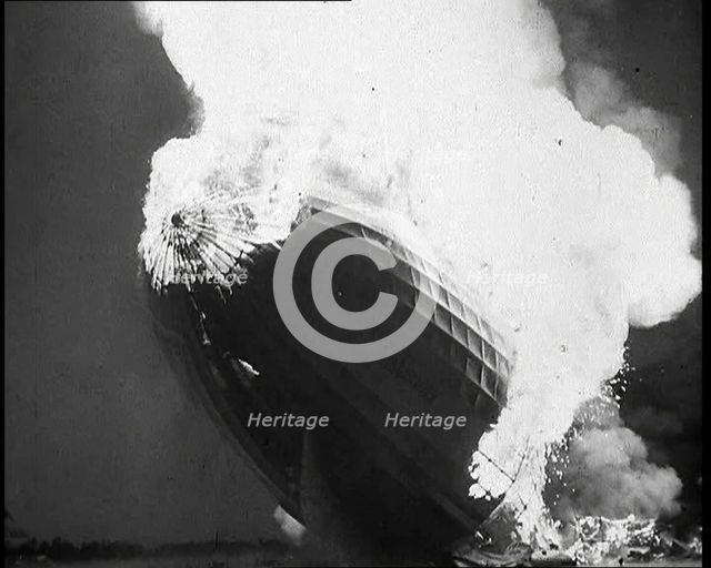 The German Airship, the Hindenburg, its Rear Half Destroyed And Obscured By Smoke With..., 1937. Creator: British Pathe Ltd.