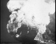 The German Airship, the Hindenburg, its Rear Half Destroyed And Obscured By Smoke With..., 1937. Creator: British Pathe Ltd