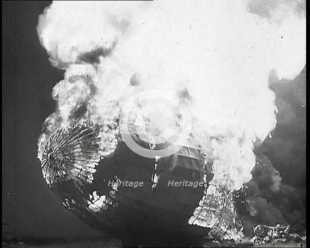 The German Airship, the Hindenburg, its Rear Half Destroyed And Obscured By Smoke With..., 1937. Creator: British Pathe Ltd.