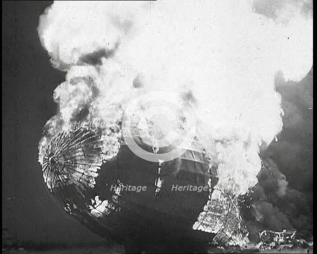 The German Airship, the Hindenburg, its Rear Half Destroyed And Obscured By Smoke With..., 1937. Creator: British Pathe Ltd.