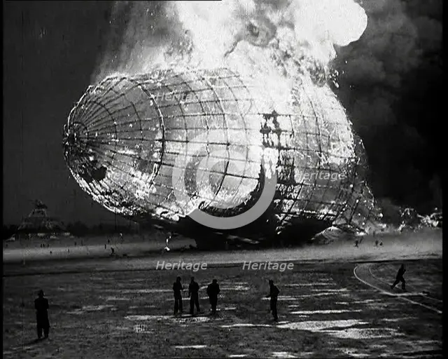 The German Airship, the Hindenburg, its Rear Half Destroyed And Obscured By Smoke With..., 1937. Creator: British Pathe Ltd.