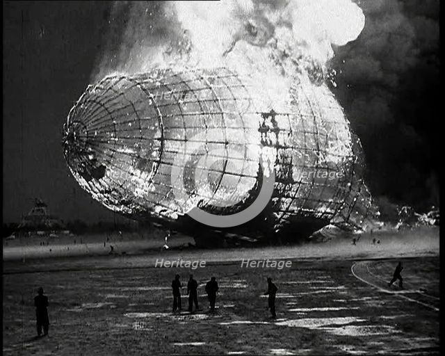 The German Airship, the Hindenburg, its Rear Half Destroyed And Obscured By Smoke With..., 1937. Creator: British Pathe Ltd.