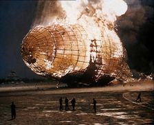 The German Airship, the Hindenburg, its Rear Half Destroyed And Obscured By Smoke With..., 1937. Creator: British Pathe Ltd