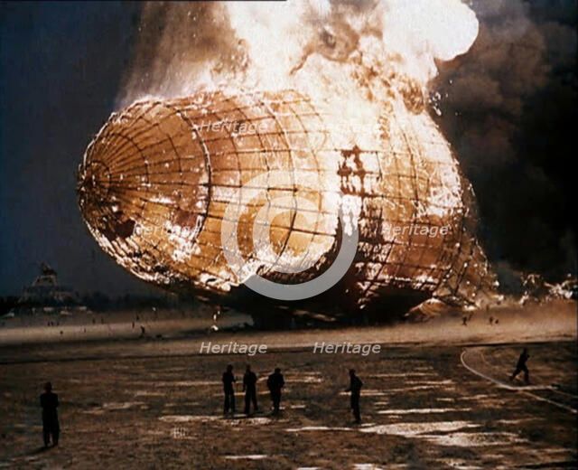 The German Airship, the Hindenburg, its Rear Half Destroyed And Obscured By Smoke With..., 1937. Creator: British Pathe Ltd.
