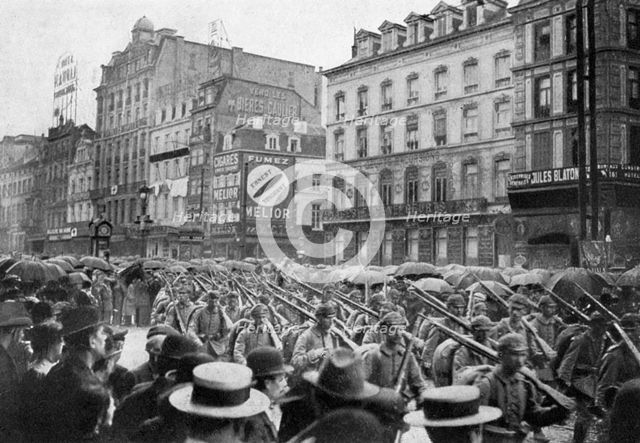 The German army marching through Brussels, First World War, c1914 (1920). Artist: Unknown