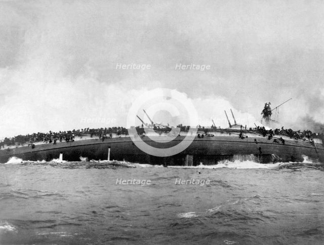 The german armoured cruiser SMS Blücher sinks after receiving multiple hits from British warships at Artist: Anonymous  