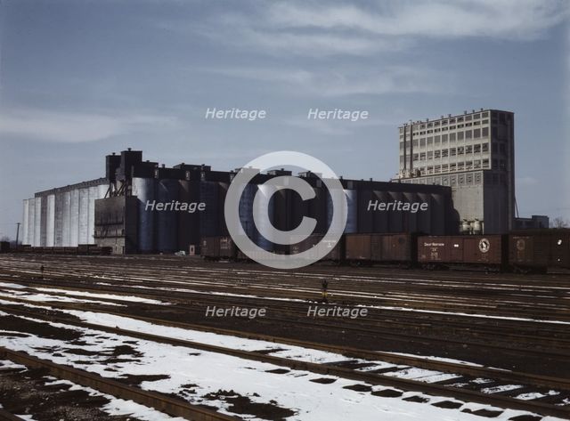 The giant 10 million bushel grain elevator of the Santa Fe R.R., Kansas, 1943. Creator: Jack Delano.