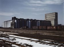 The giant 10 million bushel grain elevator of the Santa Fe R.R., Kansas, 1943. Creator: Jack Delano