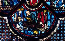 The Good Samaritan cares for the Pilgrim, stained glass, Chartres Cathedral, France, 1205-1215