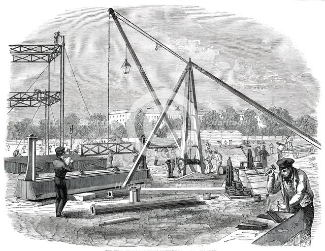 The Great Exhibition Building in Hyde Park - Unloading Girders, 1850. Creator: Unknown.