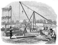 The Great Exhibition Building in Hyde Park - Unloading Girders, 1850. Creator: Unknown
